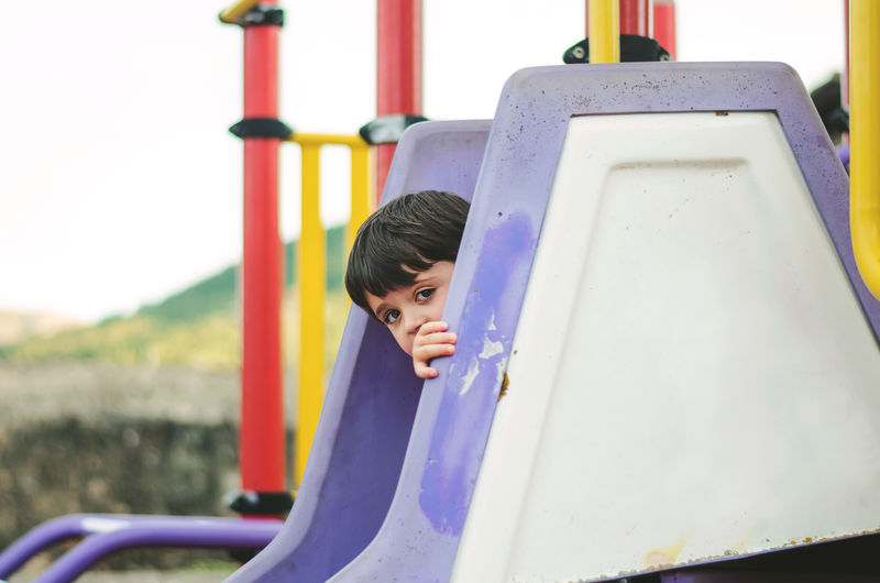 Portrait of boy in playground