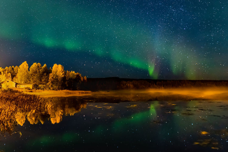 Northern lights and reflections