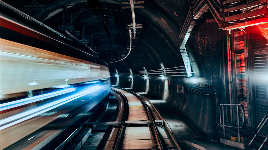 View of a train passing through the tunnel, in long exposure