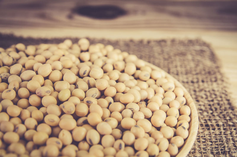 Close-up of soybeans in bowl on place mat