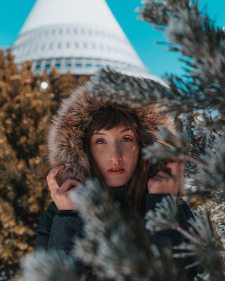 Portrait of beautiful young woman in winter
