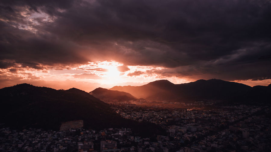 Cityscape against sky during sunset