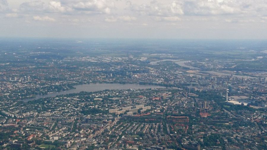 Aerial view of cityscape against sky