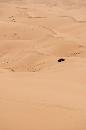 High angle view of truck on sand dune