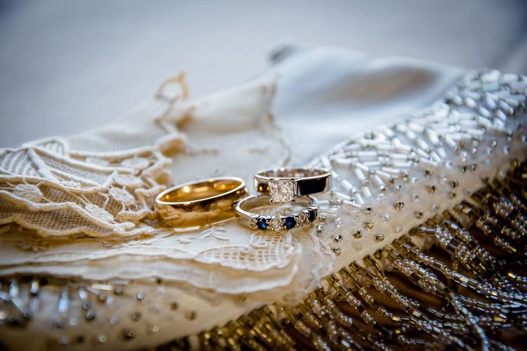 Close-up of wedding rings on cloth