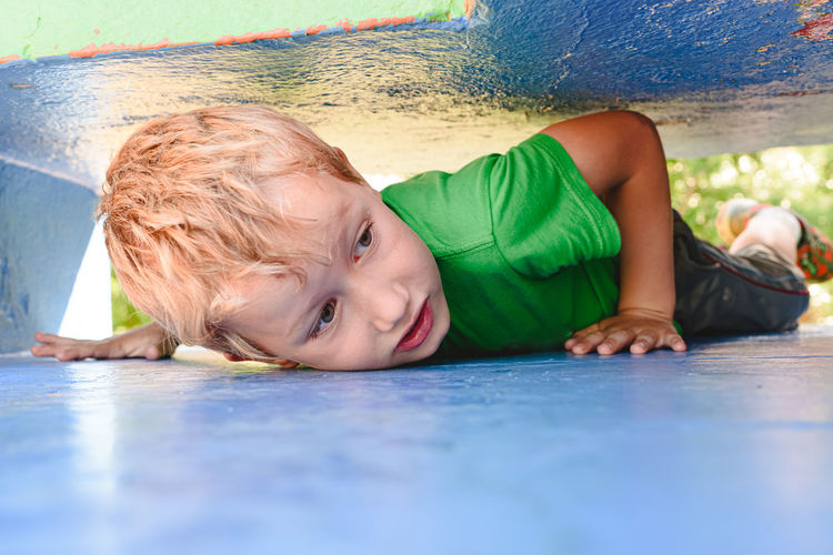 Boy lying down