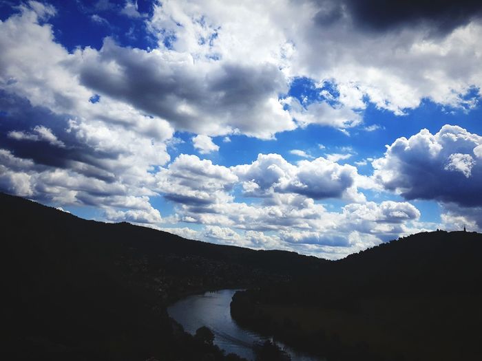 Scenic view of silhouette landscape against sky