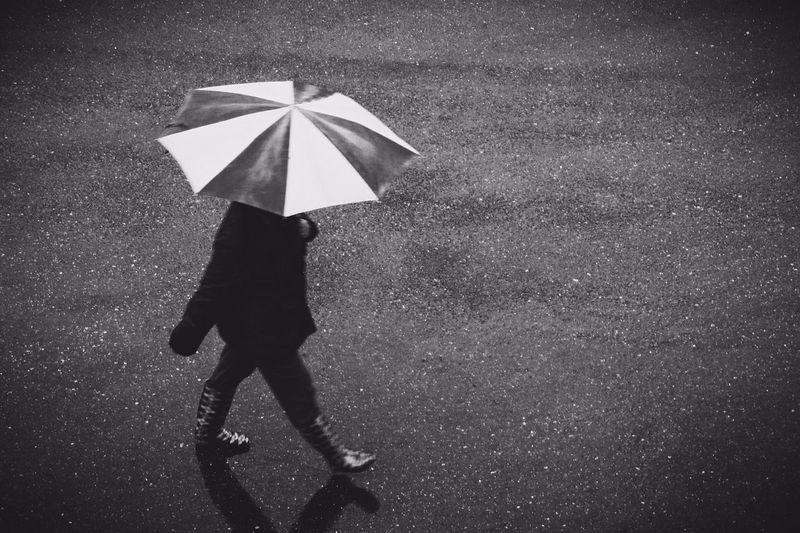 Woman standing on road