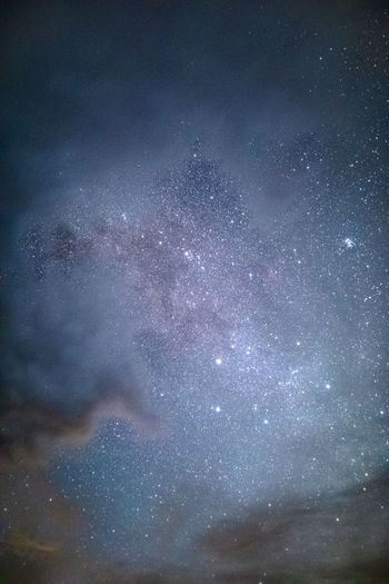 Low angle view of star field against sky at night