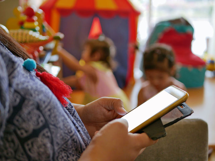 People holding mobile phone