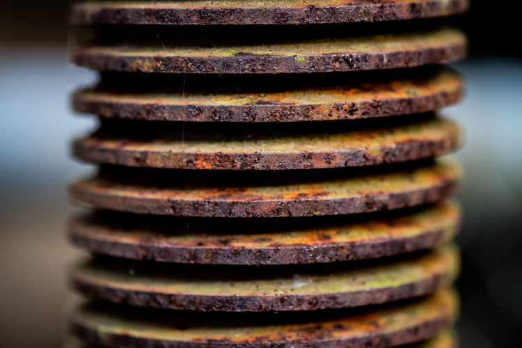 Close up view part of rust spiral for industrial gear working in factory, selective soft focus.