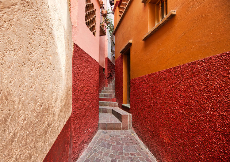 View of alley amidst building