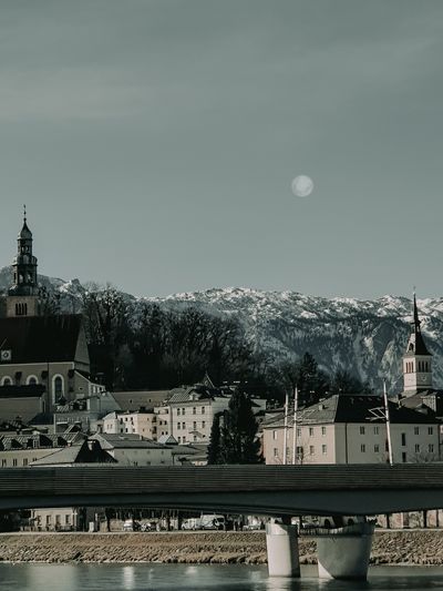 View of buildings in town against sky