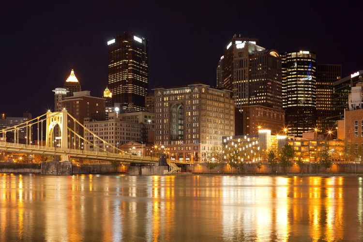 Downtown skyline and roberto clemente bridge over allegheny river, pittsburgh, pennsylvania, usa