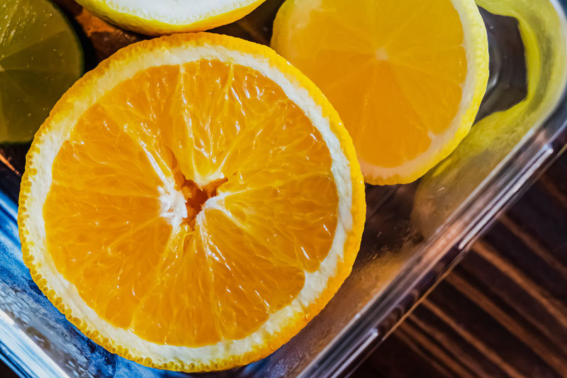 High angle view of orange slices in glass