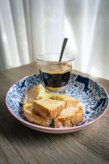 Close-up of breakfast served on table