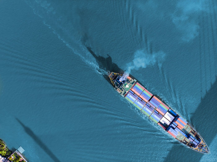 High angle view of ship in sea against sky