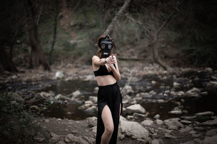 Woman wearing gas mask