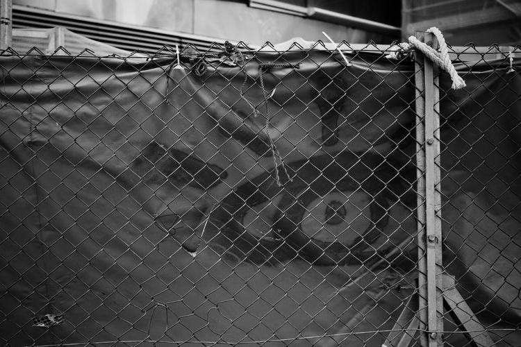 Close-up of barbed wire fence