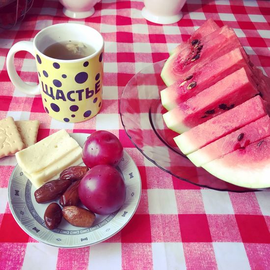 High angle view of fruits in plate on table