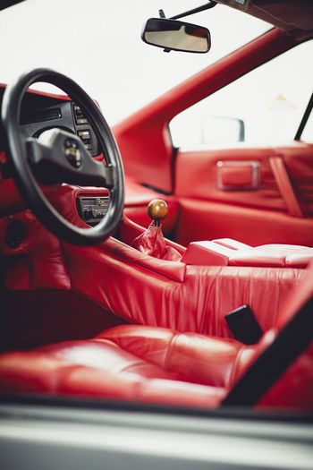 Close-up of red vintage car