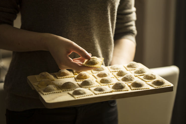 Close-up of person preparing food