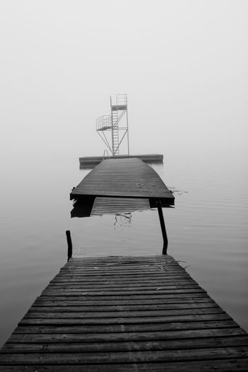 High angle view of broken pier in lake 