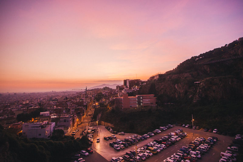 High angle view of buildings against sky at sunset