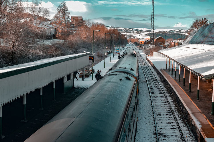 High angle view of train at railroad station during winter