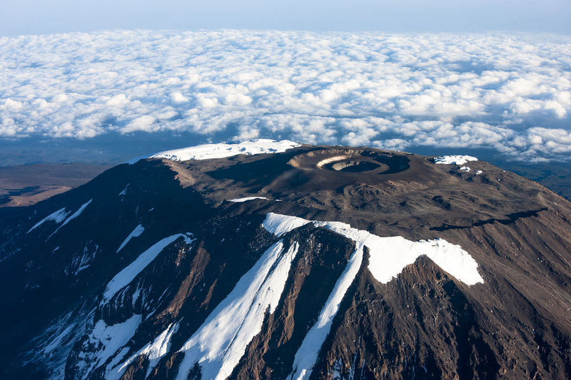 Aerial view of snowcapped mountains against sky. mount kilimanjaro .