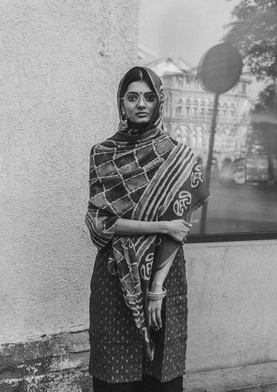 Old portrait of young cultured indian woman standing 