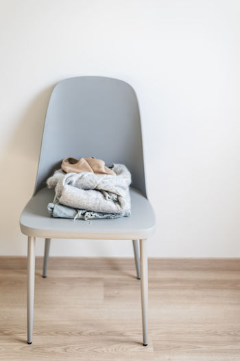Clothes on chair at home