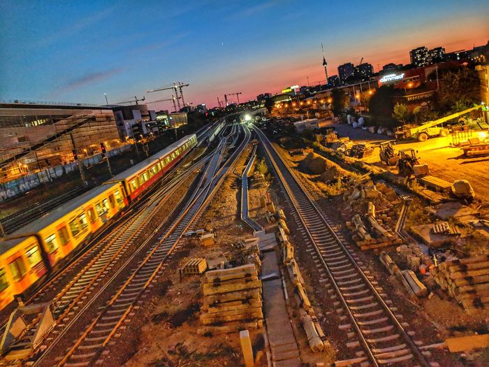 High angle view of railroad tracks at sunset