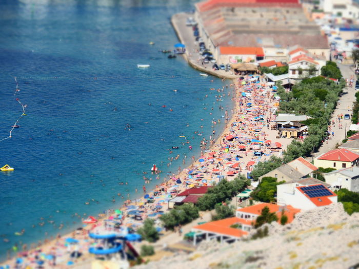 High angle view of town by sea