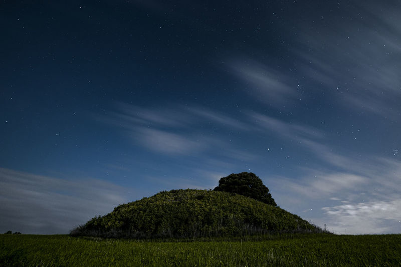 Burial mound by night.
