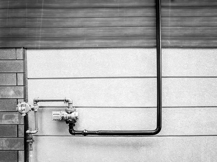 Close-up of pipe on wall
