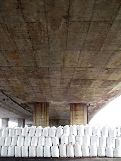 Low angle view of architectural column against sky