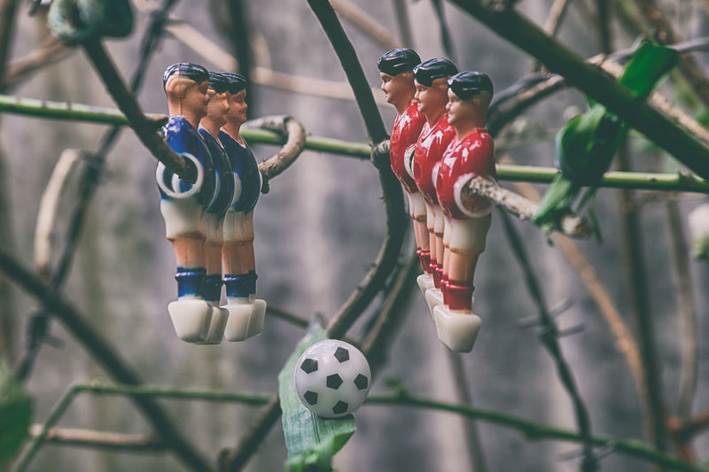 Close-up of stuffed toy on metal
