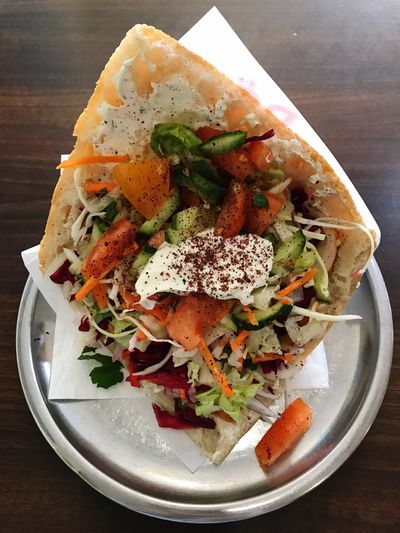 High angle view of fresh doner kebab served in plate on table