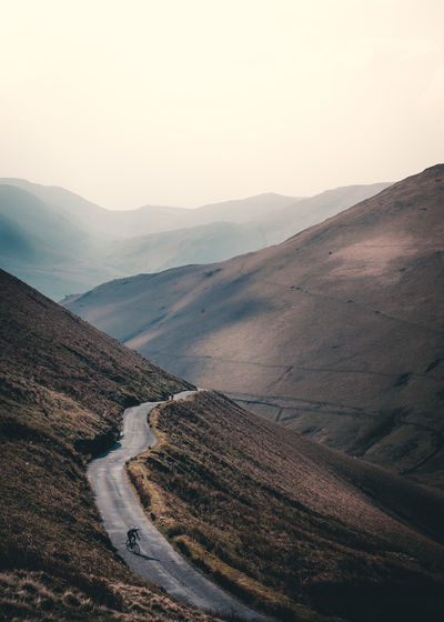 Road on mountain against clear sky