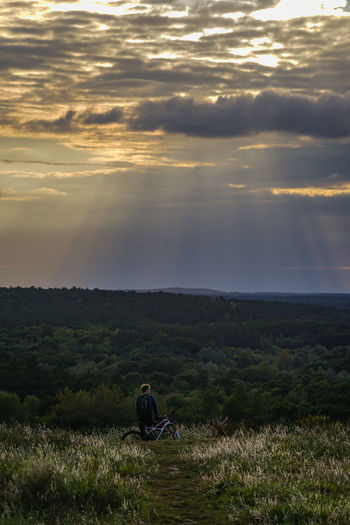 Scenic view of field against sky during sunset
