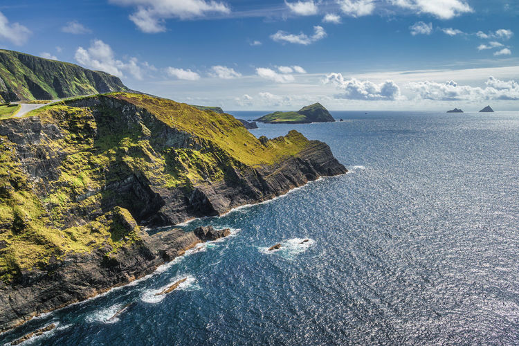 Kerry cliffs and a view on skellig michael island. star wars film location, ring of kerry, ireland