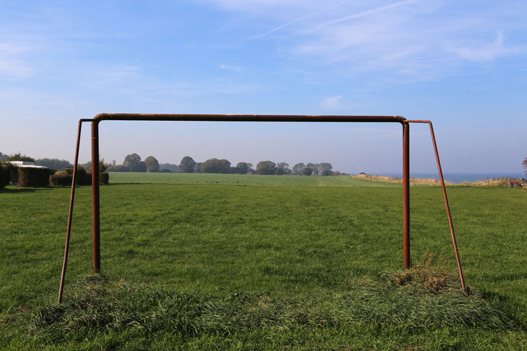 Empty soccer field against sky