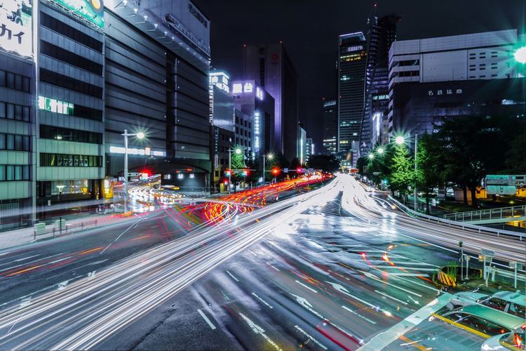 Traffic on city street at night