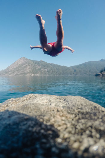 Man jumping in sea