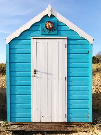Bright blue beach hut
