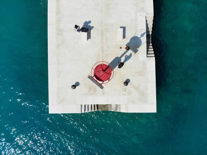 Aerial view of promenade by sea