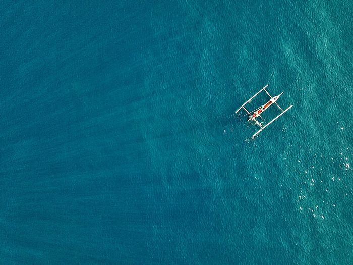 High angle view of outrigger in sea