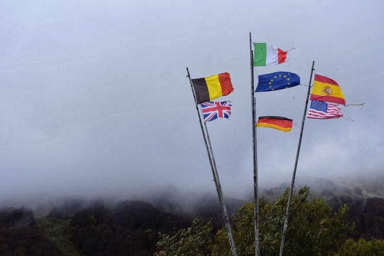Flags of various european countries on the roadside