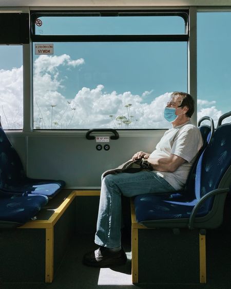 Man sitting in bus